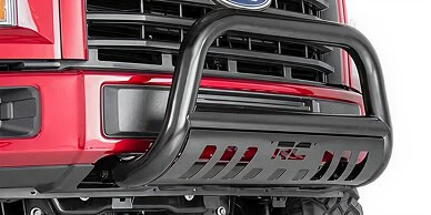 Front view of a red off-road truck with a black front bumper guard.